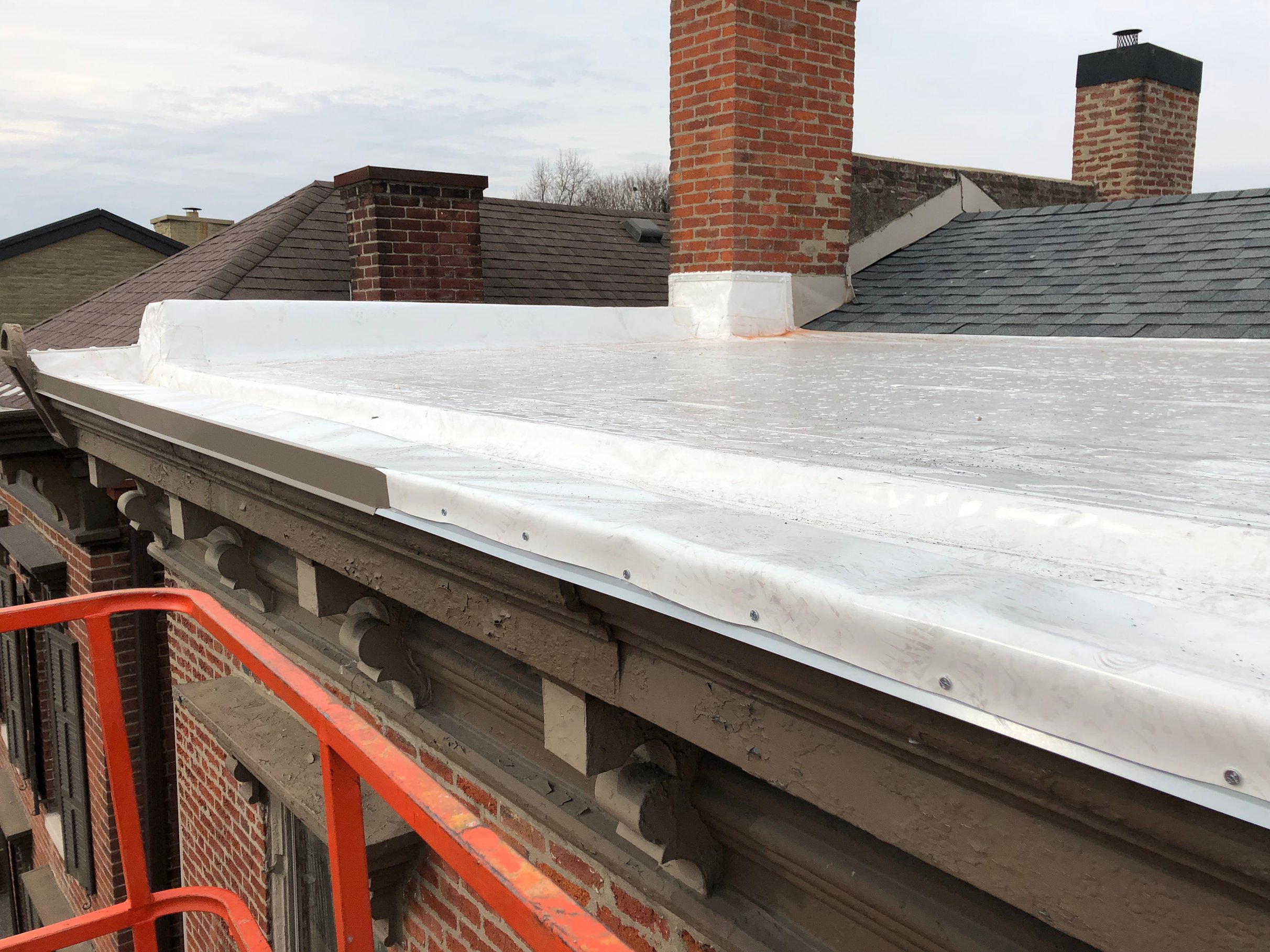 Downtown Madison, IN Flat Roof and Gutter Installation
